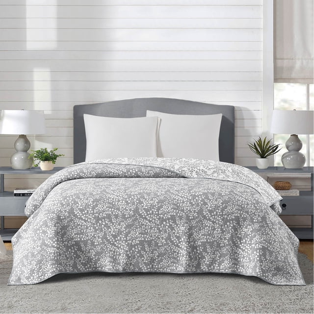 Mainstays Botanical Floral Stitched Quilt, King, Light Grey, Reversible Lightweight Bedding — centered, front-facing king quilt with stitched botanical floral pattern in light grey; quilted channels and visible stitching on soft, breathable 100% polyester; reversible solid-tone reverse on a neutral bedroom backdrop. Lightweight year-round bedding, often used as a throw or extra layer for guest beds.