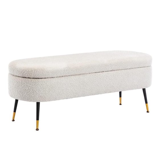 Banc de rangement Dilan avec revêtement en bouclé blanc, pieds noirs élégants avec accents dorés – un ajout fonctionnel et élégant pour les espaces modernes, offrant un rangement caché et un design so