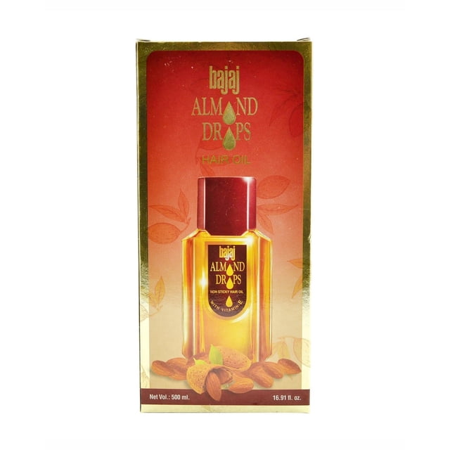 Bajaj Almond Drops Hair Oil in a 500ml bottle, featuring a golden oil with a maroon cap and packaging that highlights almonds and vitamin E benefits. The lightweight, non-sticky formula is emphasized on the box, which includes almond illustrations and product branding.