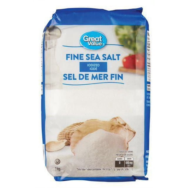 Great Value Iodized Fine Sea Salt in a 1 kg blue and white bag with seashell graphics and bilingual English-French text, iodized for added nutrition, suitable for cooking and seasoning dishes.