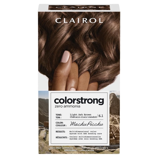 ColorStrong Permanent Hair Dye by Clairol in Light Ash Brown 6.1 Machu Picchu shade, featuring zero ammonia and AHA bonding system for multidimensional color and reinforced hair structure with 100% gray coverage, displayed on a box with a close-up of brown hair held by a hand and Machu Picchu ruins in the background.
