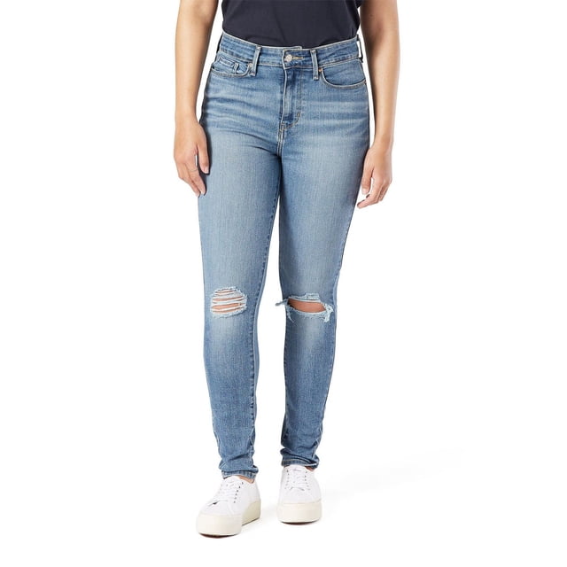 Levi Strauss Signature.™ Women's High Rise Skinny Jeans in light blue denim with distressed rips on both knees, featuring a high waist, zip fly, five-pocket styling, and skinny leg fit, shown front-facing worn with white sneakers and black top, suitable for casual or dressy looks.