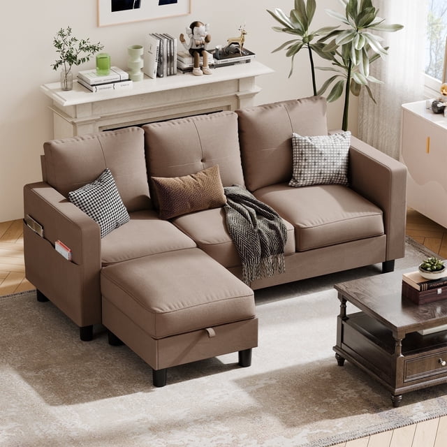 Walsunny 78-inch convertible sectional sofa couch in brown linen fabric, designed for living room seating. Features include an L-shaped configuration with a storage ottoman, side pockets, and removable foam cushions. The reversible chaise allows flexible placement, while slightly flared arms enhance the modern profile. Displayed in a warm living room with decorative pillows and a coffee table.
