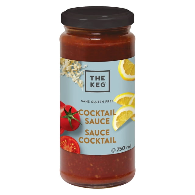 KEG - COCKTAIL SAUCE GLUTEN FREE 250ML glass jar with dark brown lid filled with red gluten-free cocktail sauce, label shows The Keg logo, lemon slices, tomato, and horseradish on light blue background, ideal for seafood dishes and suitable as a tangy dip