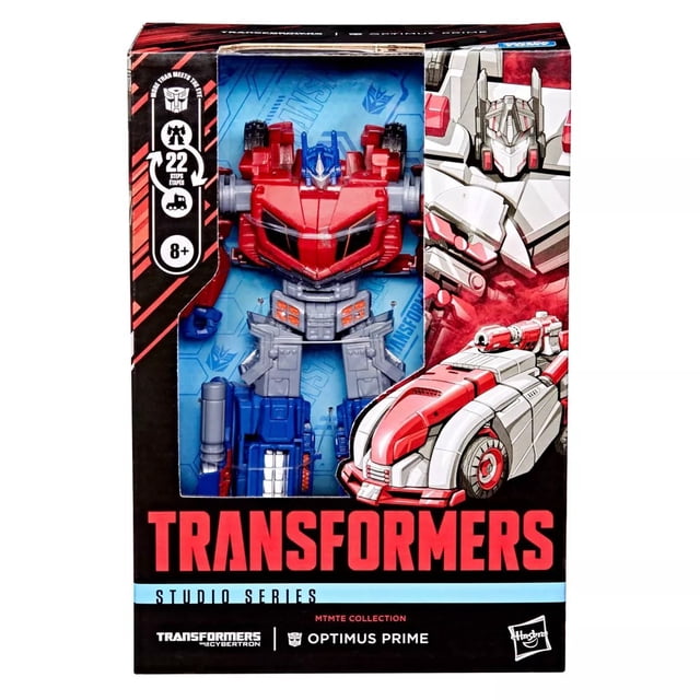 Transformers Studio Series 7 Inch Action Figure Voyager Class Exclusive - Optimus Prime by Hasbro. The action figure features a detailed design of Optimus Prime in red, blue, and silver colors, packaged in a vibrant box with Transformers branding and artwork. Suitable for ages 8 and up, it includes 22 articulated steps for transformation. Warning: Contains small parts and sharp points, not suitable for children under 3 years.