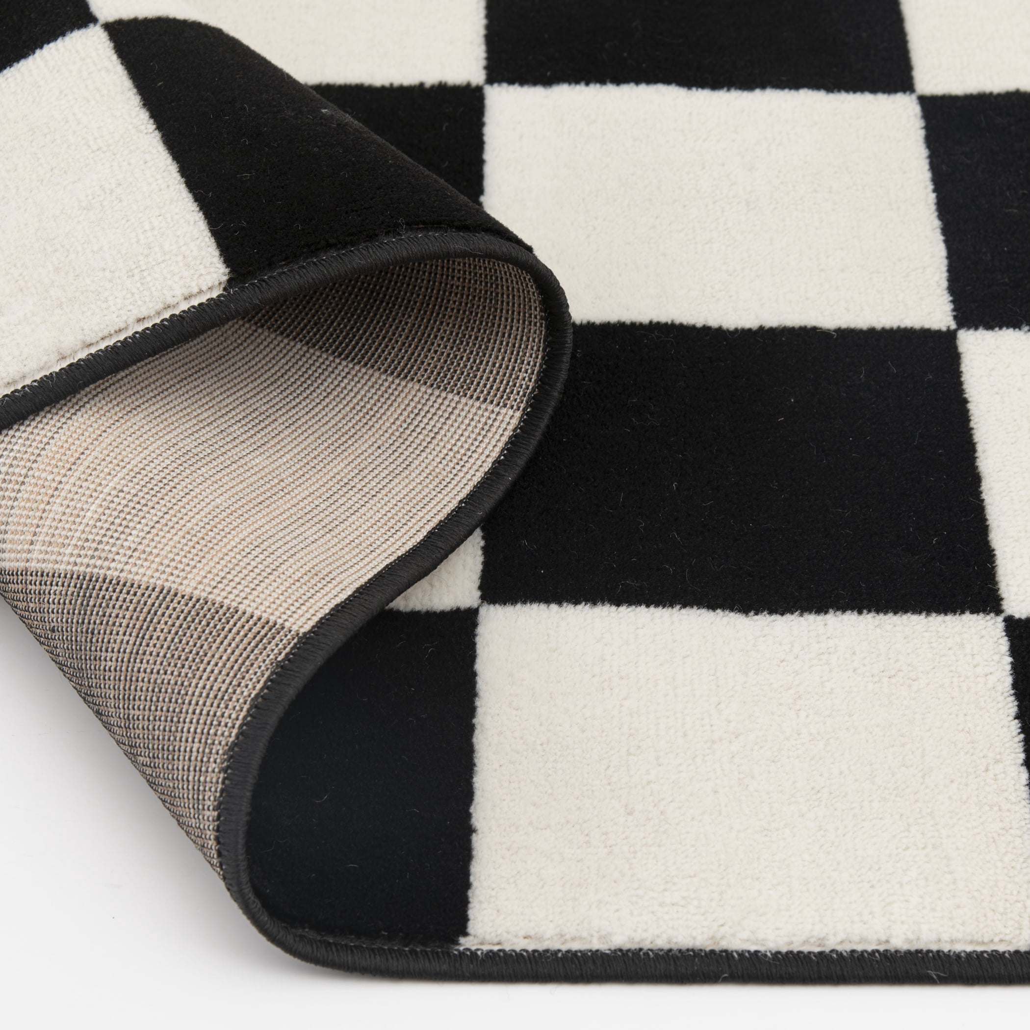 Tapis décoratif Mainstays Kids Checker à poils courts noir et blanc, 90 x 150 cm, recommandé pour le couloir, la chambre, la cuisine et la buanderie.