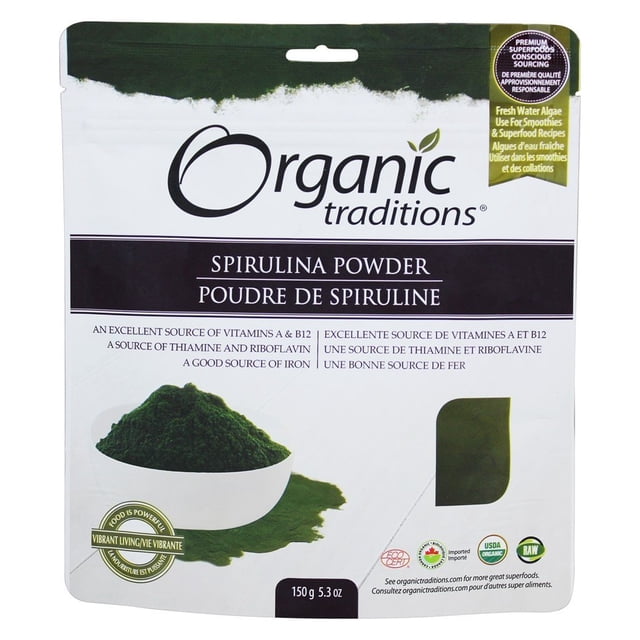 Organic Traditions Spirulina Powder, 5.3 oz (150 g) pouch with vibrant green spirulina powder shown in a white bowl on the packaging. The label emphasizes its organic certification, superfood benefits, excellent source of Vitamin A and B12, and suitability for smoothies and recipes. The brand logo and product details are clearly visible.