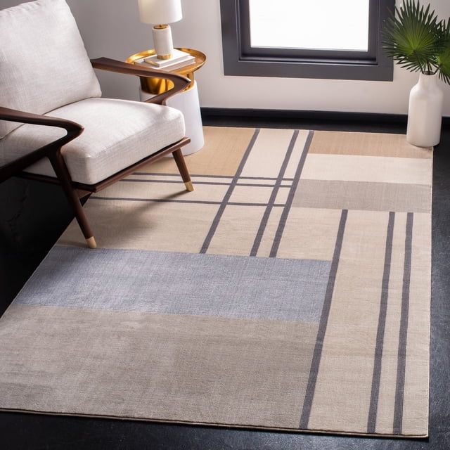 SAFAVIEH Orwell Lucille Tapis Géométrique Abstrait Présentant des Motifs Géométriques Rétro Art Déco dans des Tons beige, taupe et Gris Doux, Tissé Mécaniquement avec des Fils Synthétiques en Poil de Coupe Moyenne, Exposé dans un Espace de Vie Moderne avec un Fauteuil Mi-Siècle, une table d'Appoint à Accents Dorés et un vase Blanc avec des Feuilles de Palmier Près d'Une Fenêtre.
