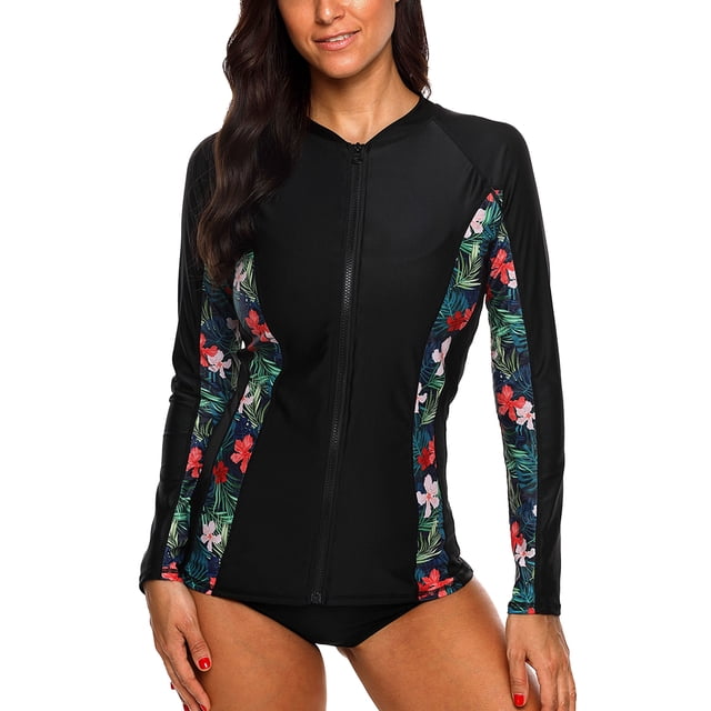 Charmo Women's Zip Front Rash Guard Long Sleeve Rashguard Top Sun Protection Swim Shirt in black with vibrant floral printed panels along the sleeves and sides. Features a front zipper for easy wear, UPF 50+ sun protection, and a crew neck design. Made from quick-dry, stretchy fabric for comfort and full range of motion. Ideal for swimming, surfing, snorkeling, and other water activities.