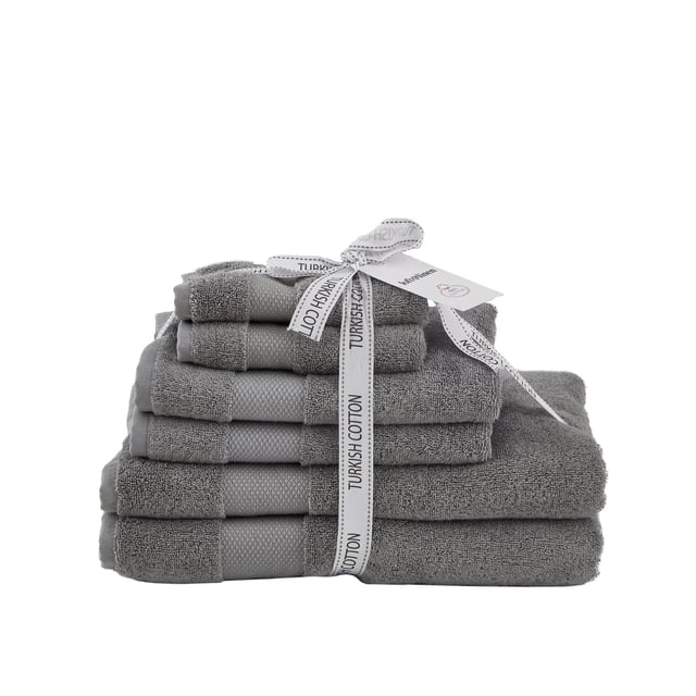 Diamond Turkish Towel Set of 6 in grey, made from 100% Turkish cotton for ultra-softness, absorbency, and quick-drying. Perfect for bathroom use, the set includes 2 bath towels (27x54in), 2 hand towels (16x30in), and 2 washcloths (13x13in). The towels are neatly stacked and tied with a ribbon labeled 'Turkish Cotton,' highlighting their plush texture and luxurious design.