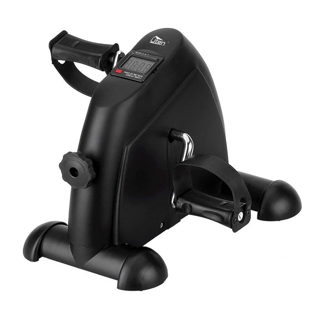 ZOGIN Mini Exercise Bike in black, designed for under-desk use to exercise arms and legs. Features adjustable resistance with a tension screw, anti-skid pedals with adjustable straps, and a sturdy frame with non-slip feet for safety. Includes an LCD screen displaying time, distance, count, total count, and calories. Compact and lightweight design with an integrated handle for portability. Ideal for low-impact workouts to improve circulation, stamina, and focus.