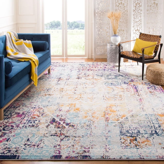 Safavieh Madison Tapis Vintage Traditionnel Cooper Présentant un Motif Multicolore Vieilli avec des Tons Bleu, orange et Violet, Placé dans un Salon Lumineux avec un sofa en Velours Bleu et un Fauteuil en Cuir Tressé avec un Coussin Jaune. le Tapis Offre un style Transitionnel durable Convenant à la Déco Maison Contemporaine et aux Tapis d'Accent.