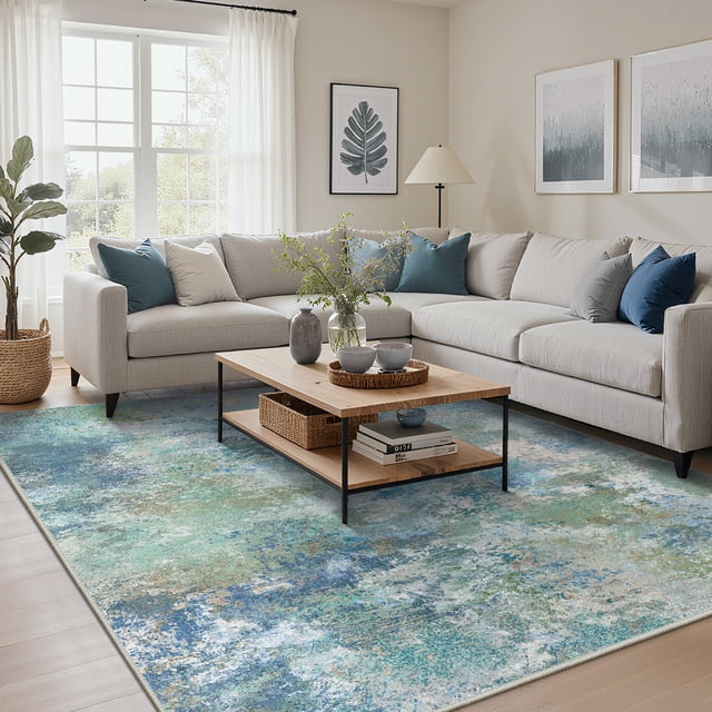 KUETH 8'x10' area rug showcased in a living room with a vintage-inspired chenille print in blue and green tones. The ultra-thin, low-pile design fits under furniture and doors, making it ideal for high-traffic areas like living rooms, dining rooms, and home offices. This lightweight indoor rug is machine washable and features a non-slip rubber backing for stability on hardwood, tile, or laminate floors.