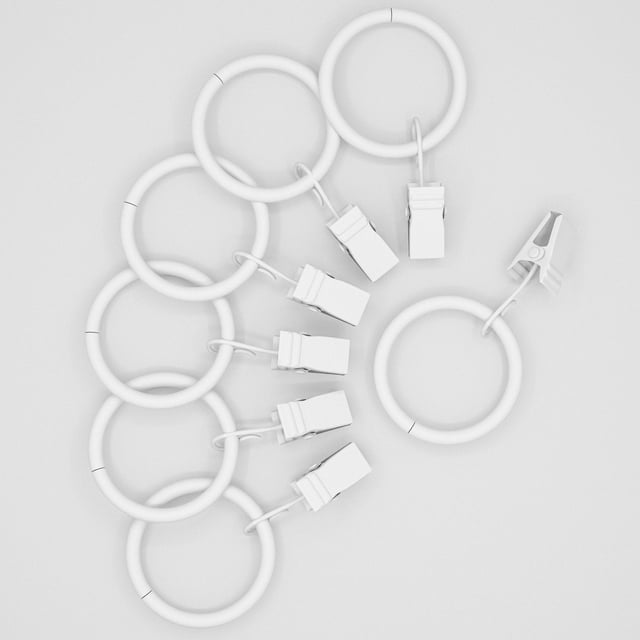Mainstays 1" White Curtain Clip Rings (7 Pack) shown on a white surface, featuring seven white metal rings with clips designed for easy curtain hanging in window coverings and drapery hardware, also often used for organizing lightweight fabrics or craft materials.