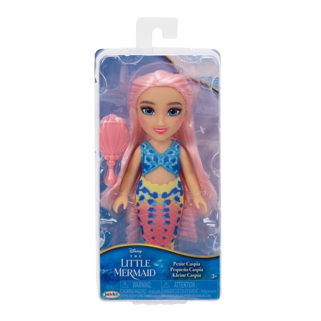 Little Mermaid Live Action - Caspia Petite Doll in packaging, featuring a 6-inch articulated doll with long pink hair, wearing a blue top and multicolored mermaid tail, and including a pink seashell-shaped brush, ideal for imaginative play inspired by Disney’s The Little Mermaid.