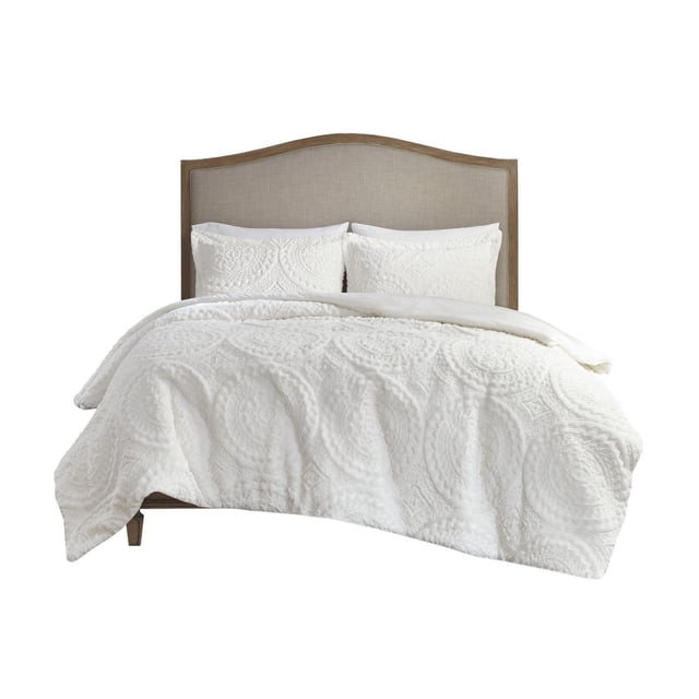 Home Essence Alivia Plush Comforter Mini Set in white with embroidered medallion design, featuring a plush comforter and matching shams on a bed with a wooden frame and beige upholstered headboard, made of ultra-soft, hypoallergenic polyester for warmth and comfort.