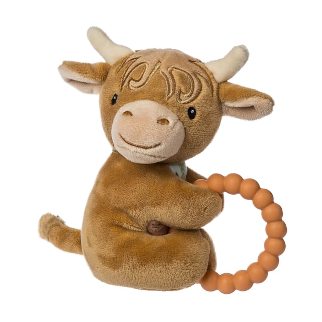 Mary Meyer - Teether Rattle - Hetty Highland Cow, a plush brown Highland cow toy with soft fur and embroidered facial details. Hetty features a silicone teether ring in a warm orange tone, held in her front legs, and an internal rattle for sensory stimulation. Suitable for infants, this machine-washable toy combines comfort and functionality, making it ideal for soothing and play.