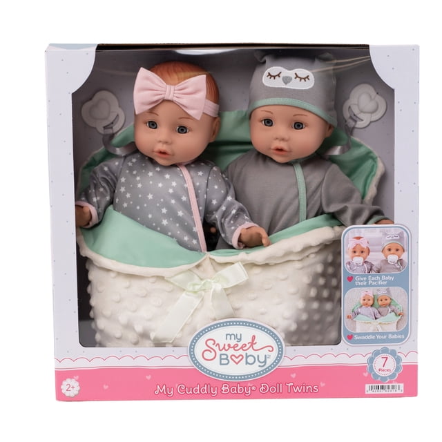 My Sweet Baby: My Cuddly Baby® Doll Twins Play Set with two 14-inch soft body baby dolls dressed in grey outfits—one patterned with white stars and pink trim, the other solid grey with mint green zipper—both wearing removable head accessories, swaddled in a white textured blanket with mint green lining, including pacifiers and a swaddle blanket, displayed in original packaging.