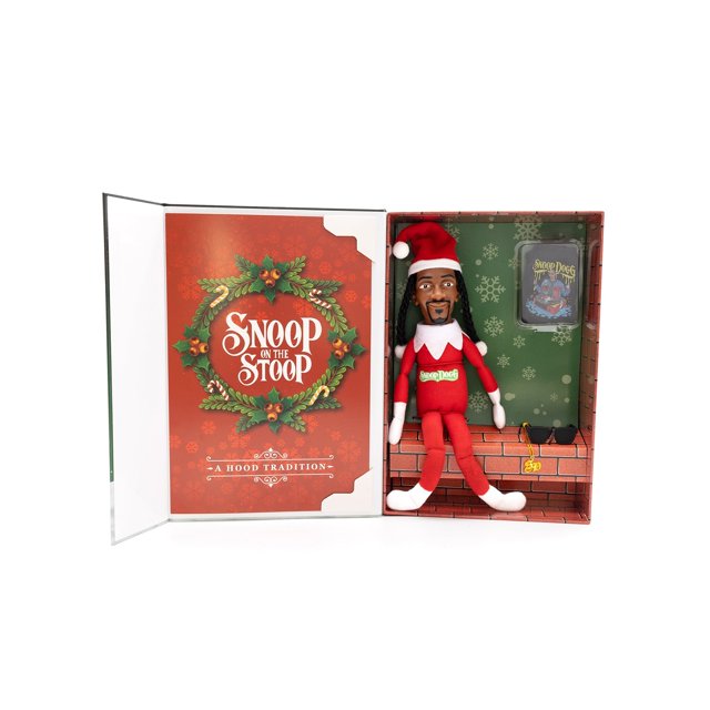 ECPECAD Snoop Dogg Christmas Elf Doll, a 12-inch plush hip hop toy, displayed in festive packaging. The doll is dressed in a red elf outfit with white accents, featuring a Santa hat, stylish sunglasses, and a necklace. The packaging includes a decorative backdrop with snowflake patterns and a 'Snoop on the Stoop' design, making it ideal for shelf decoration or holiday gifting.
