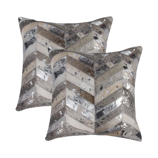 TORINO CHEVRON COWHIDE PILLOW 18"X18" 2-PACK with two grey chevron-patterned pillows made from 100% natural Indian cowhide, hand-stitched with matte and metallic textures, hidden zipper closures, and soft microsuede backs, ideal for layering in home décor and accenting multiple seats.