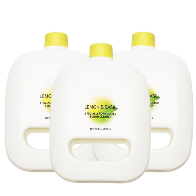 Three 930 ml (31.4 fl oz) bottles of multi-surface cleaning solution compatible with Narwal Freo and Freo X Ultra robotic vacuum cleaners. The bottles are white with yellow caps and feature a label indicating a light lemon and basil scent. Designed for deep cleaning hard floors such as tile, wood, and marble, the solution efficiently removes stubborn stains and dust while leaving a fresh aroma. Large-capacity design reduces the need for frequent refills.