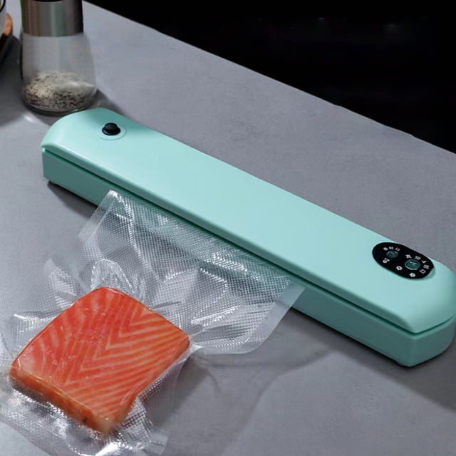 Kbndieu Vacuum Sealer Machine in blue ABS material, designed for food preservation and sous-vide cooking. The compact appliance features an LED indicator panel and a one-press automatic sealing function, shown sealing a textured vacuum bag with salmon. Ideal for kitchen use and food storage, positioned on a grey countertop.
