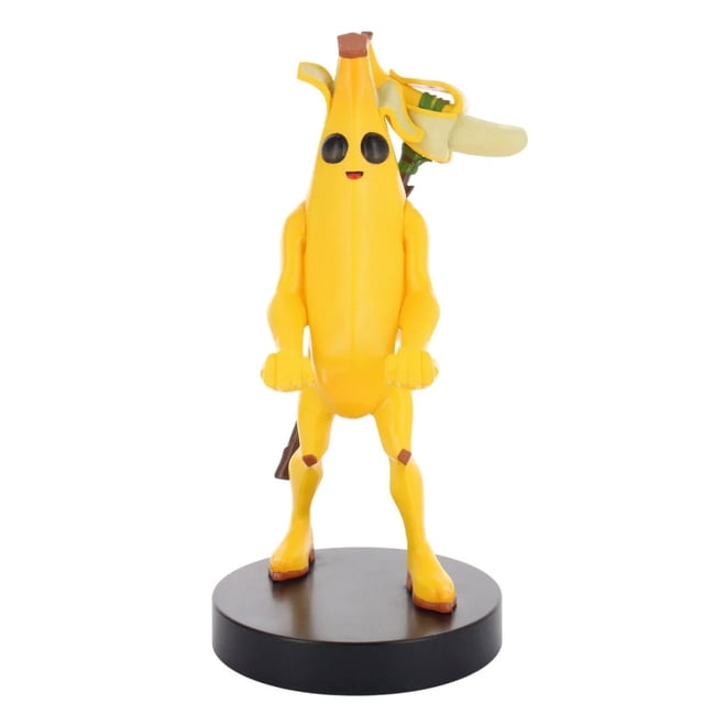 Exquisite Gaming Fortnite: Peely Cable Guy Original Controller and Phone Holder Centered 8"/21cm Peely banana figure with a slot to hold controllers and smartphones, rear cable channel and weighted base for stability; compatible with PS5 DualSense, Xbox Series X/S and iPhones. Often used as a desk controller stand or collectible display.