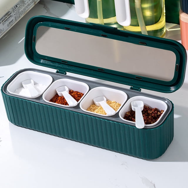 Vaidha 4 Grids Seasoning Box Spice Jar Kitchen Organizer and Storage Spice Jars. A green ABS plastic container with four separate compartments, each holding a different spice and equipped with a white spoon. The box features a wide mouth for easy access and a dust-proof integrated cover. Dimensions are 28x8x8cm, suitable for organizing dry seasonings and cooking spices in a tidy and hygienic manner.