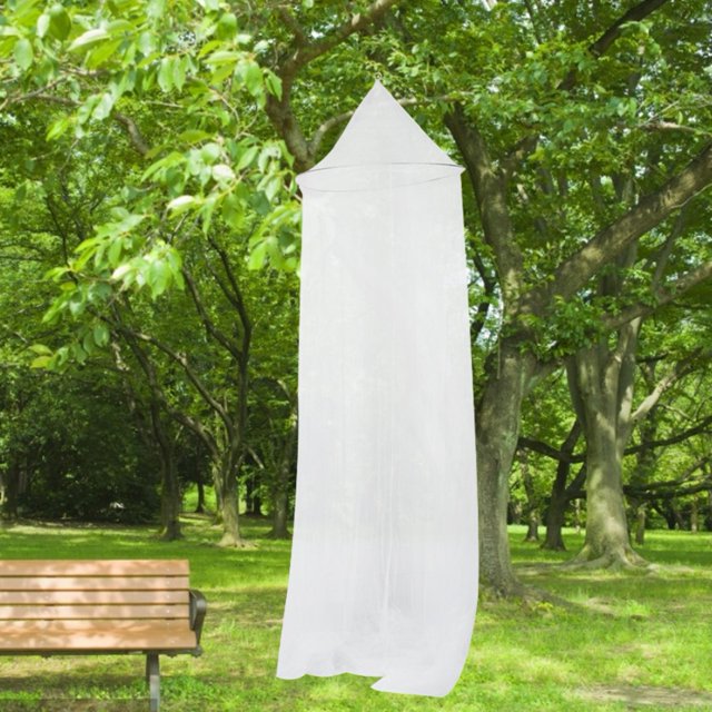 Keenso Mosquito Netting, a breathable lace mosquito bed net in romantic white mesh, designed to protect against mosquitos, flies, and insects. Made of durable polyester material, it features delicate lace trim and a fine, see-through mesh for airflow. Ideal for camping accessories or outdoor use, it is shown hanging among trees in a park setting.