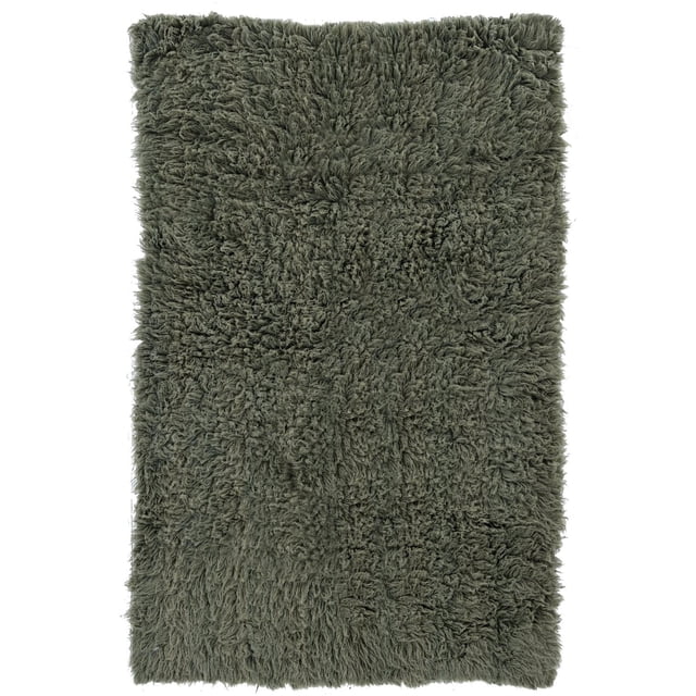 New Flokati 1400gr 5' x 8' Area Rug in olive, hand woven in Greece from 100% New Zealand wool with a deep plush shag pile, featuring a textured high-pile surface that adds warmth and an earthy boho vibe to bedrooms or living rooms, also suitable as a cozy floor accent.