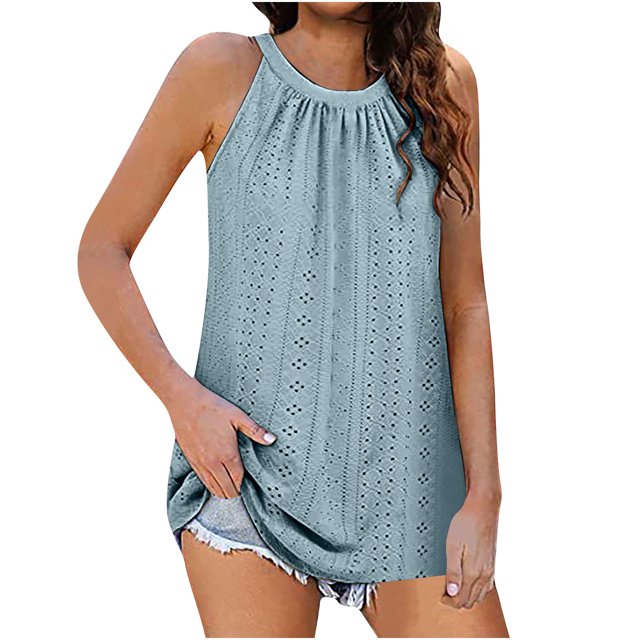 Timegard Eyelet Tank Top for Women featuring a round neck and ruched sleeveless design. Made from a blend of polyester and spandex, this lightweight and breathable summer top is shown in a textured eyelet pattern with a relaxed fit. The model pairs it with denim shorts, highlighting its casual and versatile style.