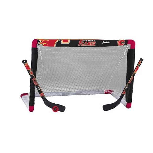 Flames Mini Hockey Goal Set with 28” x 20” x 15” high-impact plastic tubing goal and durable 900D polyester net, two Calgary Flames mini hockey sticks with pre-curved blades, and a soft 2” EVA foam ball, suitable for indoor team sports and skill practice.