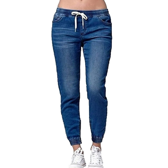 Womens Elastic Waist Pencil Stretch Denim Skinny Drawstring Jeans Pants Trousers in a medium blue shade. These jeans feature a comfortable elastic waistband with a white drawstring, tapered legs, and cuffed hems. Made from stretchable denim, they are ideal for casual outings and everyday wear.