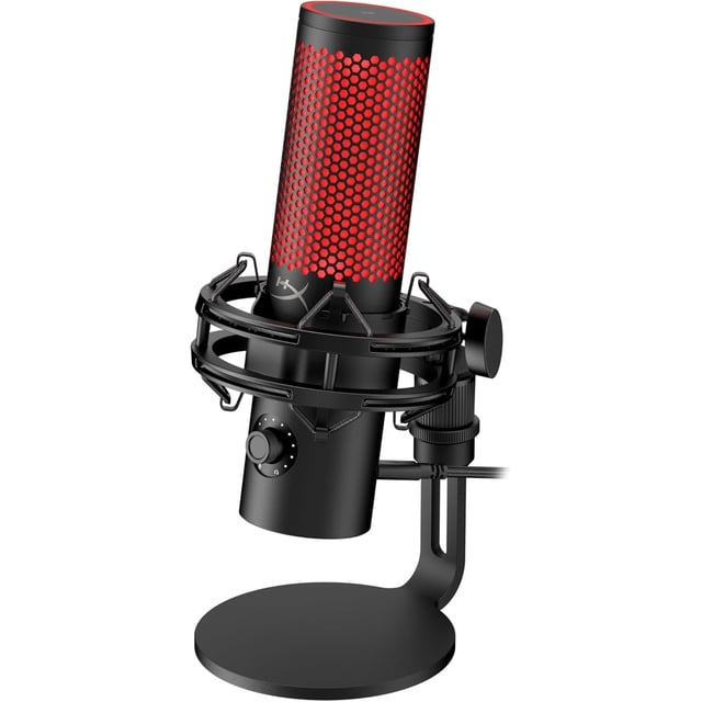 HyperX QuadCast 2 USB microphone in black with red hexagonal mesh grille, mounted on a black shock mount and round desktop stand, featuring a control knob, tap-to-mute sensor, and USB-C connection, ideal for studio-quality recording, gaming, streaming, and podcasting on PC, Mac, PS5, and consoles.