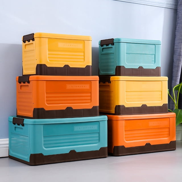 Storage Box Large Capacity Heat Resistant Plastic Folding Toys Organizer Holder for Home. The image shows a set of stackable storage boxes in yellow, orange, and peacock blue colors with brown accents. These boxes feature a folding design, large capacity, and handles for easy carrying. Suitable for organizing items in homes, dorms, or households. Available in three sizes: small (34cm x 23cm x 23cm), medium (40cm x 28cm x 23cm), and large (48cm x 34cm x 23cm).