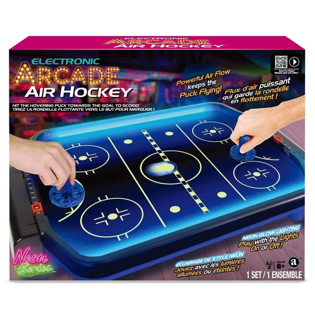 Merchant Ambassador table d'Arcade Électronique Air Hockey avec surface Lumineuse Bleu Néon Marquée comme une Patinoire de Hockey, Deux Poussoirs Bleus Tenus par les Mains des Joueurs et une Rondelle Flottant sur un Flux d'Air Puissant, Conçue pour 2 Joueurs de 6 Ans et Plus avec Éclairage Néon Pouvant Être Allumé Ou Désactivé.
