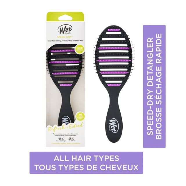 WETBRUSH Charcoal Infused Anti Frizz Speed Dry hairbrush with black vented oval head and purple heat-resistant bristles, ergonomic black handle with Wet Brush logo, shown with white retail packaging highlighting anti-frizz, charcoal infusion, and quick drying features, suitable for all hair types and gentle detangling during blow drying.