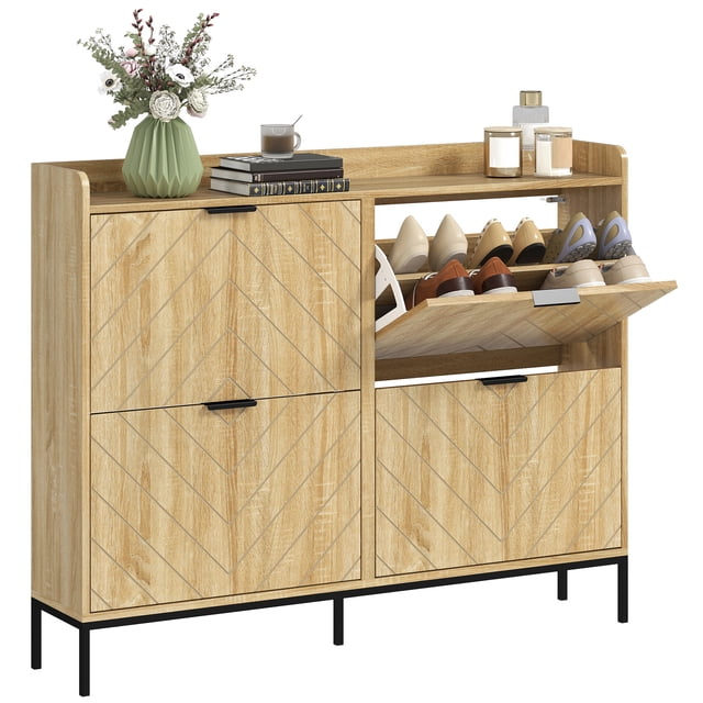 HOMCOM Slim Shoe Cabinet in oak finish with a natural wood grain and chevron pattern. Features four adjustable flip drawers accommodating up to 16 pairs of shoes, a raised-edge tabletop for accessories, and a slim design ideal for small spaces. Constructed with a steel frame and particleboard, it includes a ventilated back to prevent odors and a 5.3-inch gap underneath for robot vacuum access. Dimensions: 43.3 inches wide, 9.3 inches deep, and 37.6 inches high.
