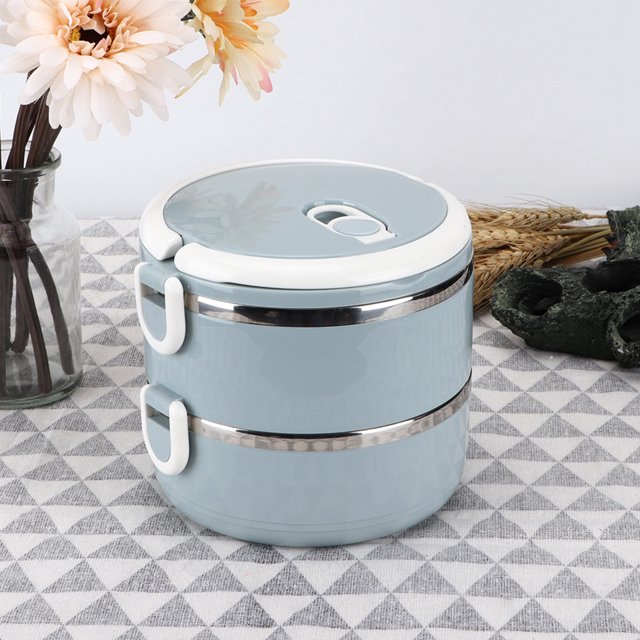 Jadeshay Thermal Lunch Box - Portable Stainless Steel Blue Thermos Insulated Rice Noodles Lunch Box Food Container with a 0.7L capacity per layer, shown in a two-layer configuration. The lunch box features a light blue exterior with white safety latches and a built-in silicone seal ring for insulation. It includes an arch handle for easy carrying and a ventilation hole on the lid for secure sealing. The compact design is ideal for keeping meals warm and fresh, suitable for office or travel use.