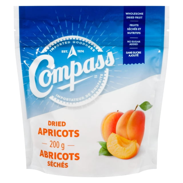 Compass Dried Apricots 200 g resealable bag with blue and white gradient background, featuring the Compass logo, orange text for dried apricots weight, and a detailed image of whole and sliced apricots with green leaves, labelled as wholesome dried fruit with no added sugar, ideal for cereals, salads, yogurt, or trail mixes.