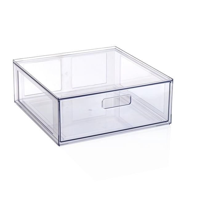 Mainstays Clear Glossy Plastic Pull-Out Closet Drawer Large Size, adult size, shown in a front 3/4 view. This transparent glossy plastic drawer measures 14 by 13.78 by 5.5 inches and features a rectangular cutout handle. It is ideal for closet storage and drawer organization, suitable for clothing and accessories.