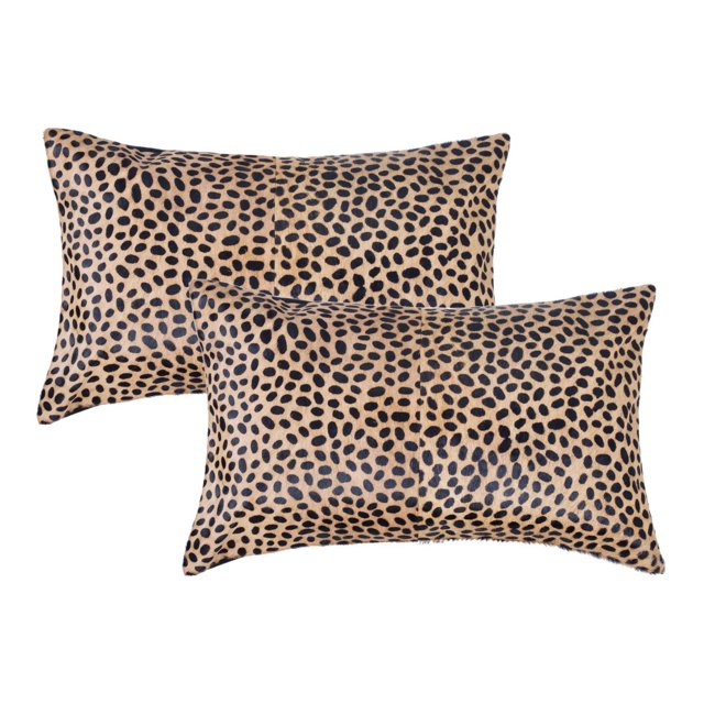 TORINO TOGO COWHIDE PILLOW 12"X20" 2-PACK with two rectangular throw pillows featuring natural Indian cowhide in a tan and black spotted pattern, hand-stitched with hidden zipper closures and soft microsuede backing, ideal for layering in home décor and adding warmth and texture.