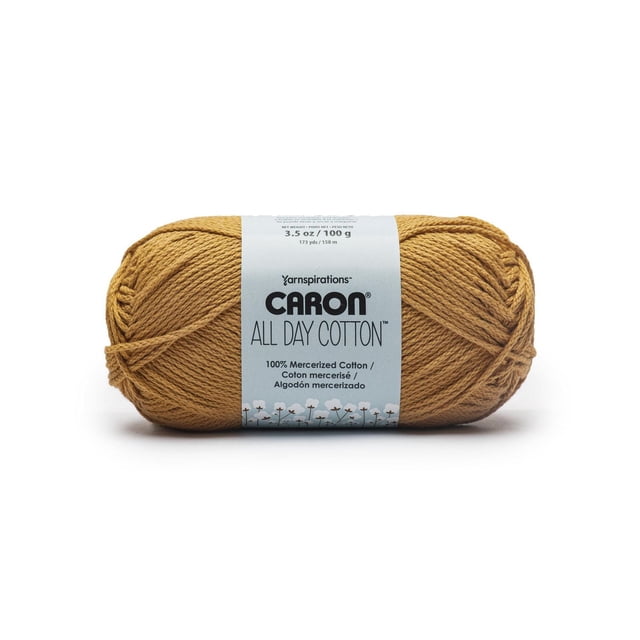 Caron® All Day Cotton™ #4 Worsted (Medium) Cotton Yarn, 3.5oz/100g 173 Yards in mustard yellow, a skein of 100% mercerized cotton yarn with smooth texture and clear stitch definition, wrapped with a light blue label showing brand and fiber details, ideal for knitting, crochet, and crafting projects.
