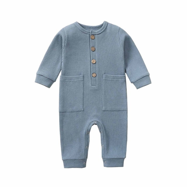 Autumn Spring Baby Girls Boys Cute Romper Long Sleeve Button Sweatshirt Jumpsuits. A light blue, ribbed cotton romper with long sleeves, a button-up front, and two front pockets. Features cuffed sleeves and ankles, and bottom snaps for easy diaper changes. Ideal for casual wear, photo shoots, or special occasions.
