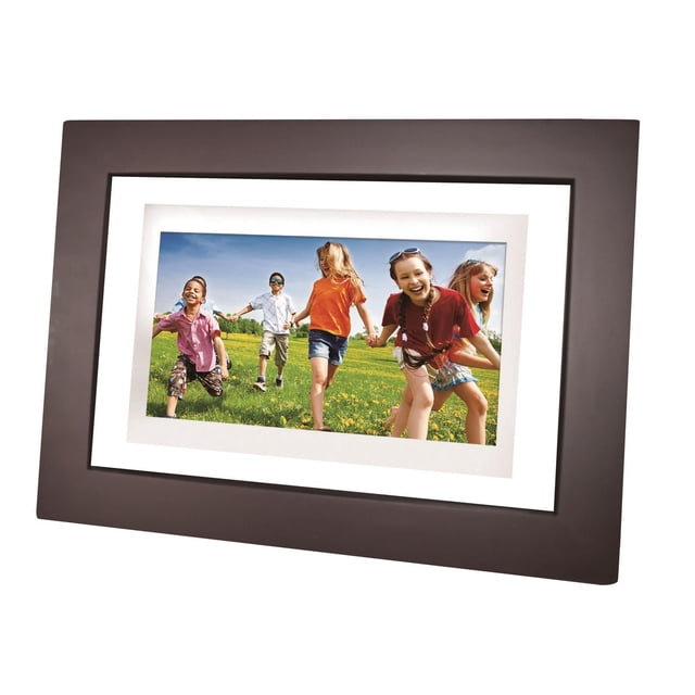 Proscan 10" LCD Touch Screen 16GB Digital Picture Frame with Wi-Fi and Cloud in black showing a vibrant photo of children holding hands and running on a grassy field under a blue sky, framed by a sleek black border and white matting, suitable for displaying dynamic family memories.
