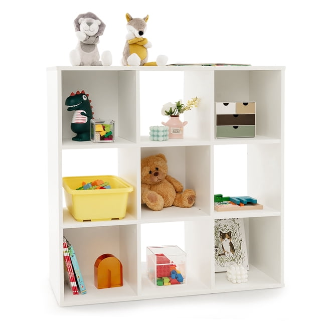 Costway 9-Cube Kids Toy Storage Organizer Wooden Children's Bookcase Display Bookshelf in white, featuring nine open storage compartments and a spacious top. The sturdy engineered wood and MDF construction supports up to 352 lbs, with anti-toppling devices and non-slip foot pads for safety and stability. Ideal for organizing toys, books, and decor in kids' rooms, playrooms, or kindergartens. Dimensions: 35.5 inches by 11.5 inches by 35.5 inches.