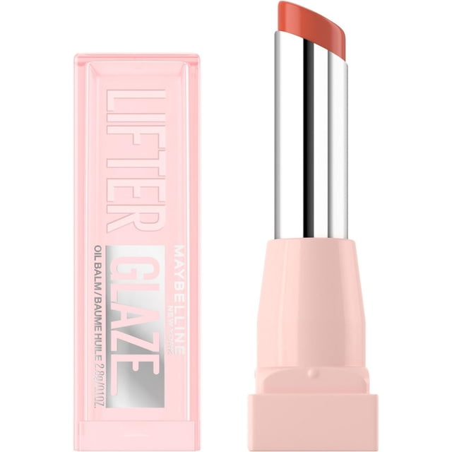 Maybelline New York Lifter Glaze Oil Balm in a soft pink tube with a clear pink cap embossed with 'LIFTER GLAZE'. The coral balm provides up to 24-hour hydration and a glossy, smooth finish ideal for daily lip care.