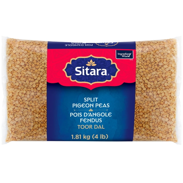 Sitara Split Pigeon Peas (Toor Dal) in a clear plastic bag with a blue and red label displaying the Sitara brand, bilingual product name, and 1.81 kg (4 lb) weight, containing yellow split pigeon peas used in Indian and South Asian cooking, ideal for dals, soups, and stews, often soaked before cooking.
