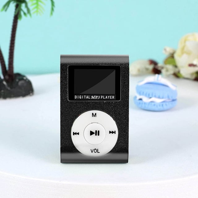 EGNMCR Portable MP3 Player with mini USB LCD screen, designed for sports and music playback. The compact black and white player features circular control buttons and is displayed upright on a white surface with decorative items in the background.