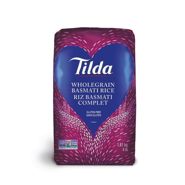 Tilda Riz Basmati à Grains Entiers dans un Sac Violet et Bleu de 1,81 kg (4 lb) avec un Motif en Forme de Cœur, Étiqueté Sans gluten et Vérifié non-OGM, Idéal pour les Plats Indiens et d'Asie du Sud, Riche en Fibres Naturelles et en Nutriments avec une Saveur de Noisette.